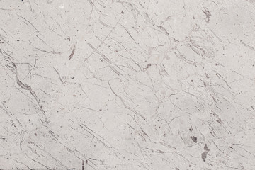 Fragment of stone texture with scratches and cracks. Natural Background.