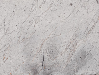 Fragment of stone texture with scratches and cracks. Natural Background.