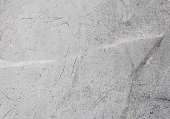 Fragment of stone texture with scratches and cracks. Natural Background.