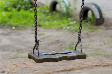  swing on the iron chain, on the Playground