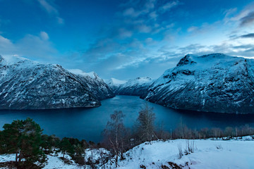 Geiranger fjord in winter snow landscape