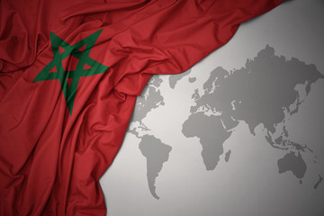 waving colorful national flag of morocco. © luzitanija
