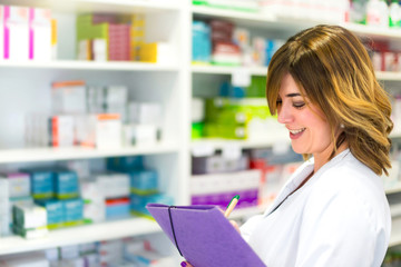 Woman customer with a folder in the pharmacy