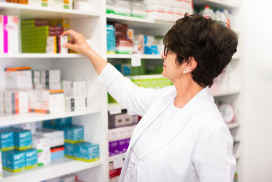 Middle-aged woman customer in the pharmacy