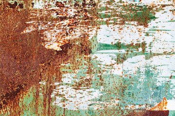 Old grunge metal wall with peeling paint