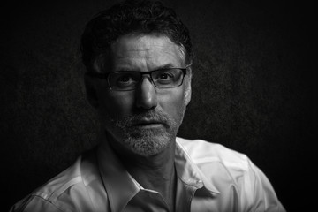 Fine art portrait of a man in black and white