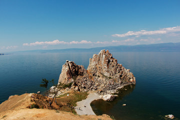 Rock Shamanka on the island of Olkhon, Baikal. Summer landscape.