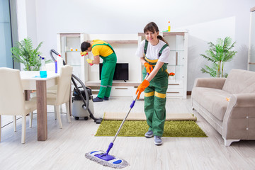 Cleaning professional contractors working at house