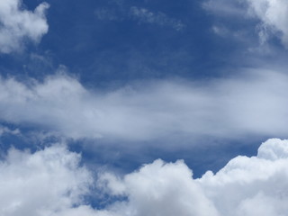 White clouds over blue sky