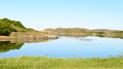 Fototapeta premium Lovely windless morning in the Swedish west coast. Sandvik on Orust.