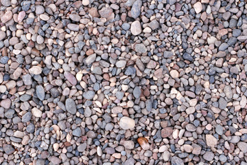 gray background, small stones, a lot of small pebbles