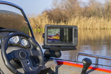 Fishing boat with fish finder, echolot, sonar and structure scaner aboard - obrazy, fototapety, plakaty