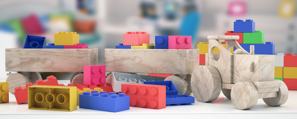 Plastic building blocks,train and blur background - obrazy, fototapety, plakaty