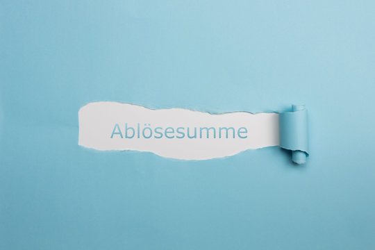Schrift Abl&ouml;sesumme auf gerissenen Papier