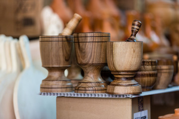 Various wooden products in the souvenir shop window.