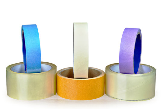 Several multi-colored rolls of duck tape, isolated on white background.