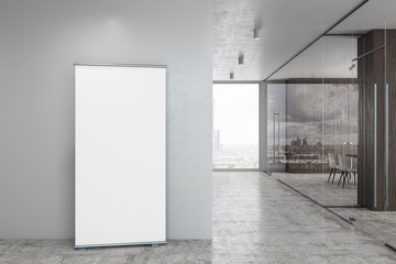 Fototapeta na wymiar Modern glass corridor with ad stand