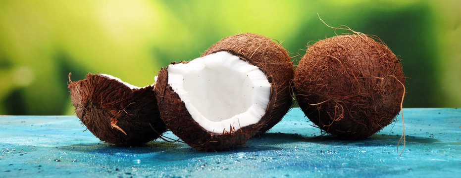 Ripe Half Cut Coconut On A Blue Background