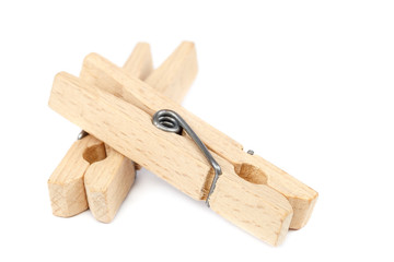 Wooden clothespins isolated on a white background.