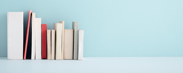 Books on a shelf - Powered by Adobe