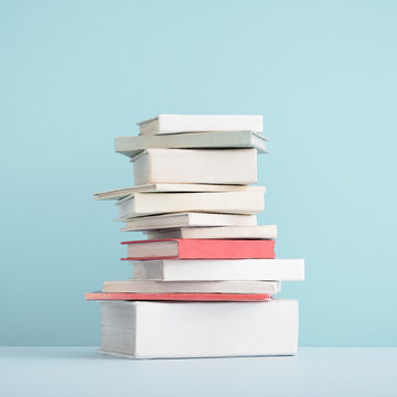 Stack of mini old books.