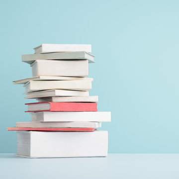 Stack of mini old books.