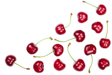 Sweet red cherries isolated on white background with copy space for your text. Top view. Flat lay pattern