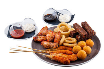 Large plate with snacks for beer served