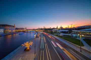 Panoramic view of Moscow landmark and road with traffic during sunset from Zaryadye Park