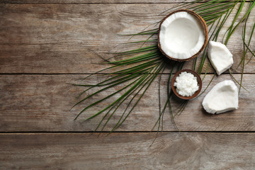 Composition with coconut oil on wooden background, top view. Healthy cooking