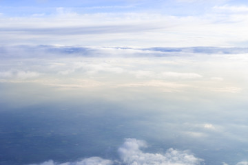 Obraz premium Skyline View above the Clouds from Airplane