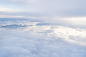 Skyline View above the Clouds from Airplane