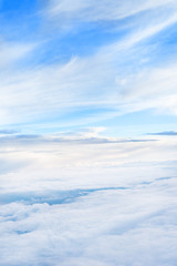 Skyline View above the Clouds from Airplane