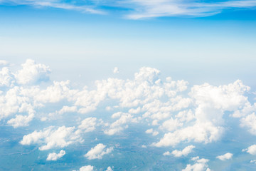 Skyline View above the Clouds from Airplane