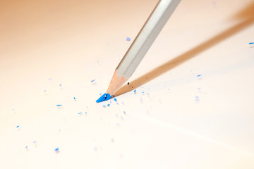 close up of blue and gray color pencil head break
