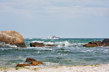 Fototapeta na wymiar Yacht near the Black Sea coast. Sea mood