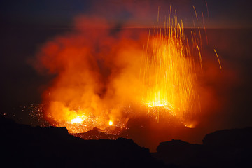Stromboli volcano eruption at sunset