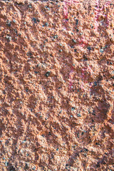Rough durable textured stucco wall coating. Abstract patchy background.