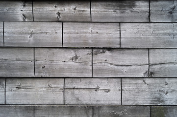 Old wooden boards with cross strips, wooden texture.