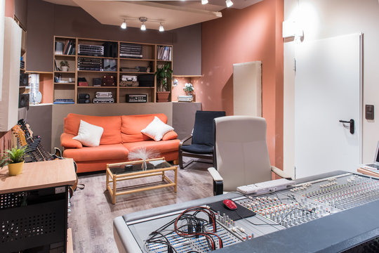 Set of guitars near sofa