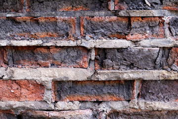 The collapsing wall of brick blocks, a stone texture.