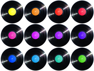12 vinyl records (1500px height size) and labels in different colors. Clippling paths included.