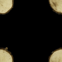 Frame from wooden slices on a black background