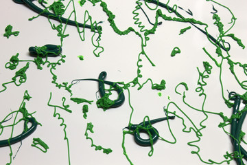 Green paint splatter on a White background