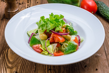 Vegetable salad with tomatoes and cucumbers