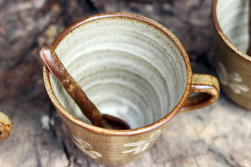 A traditional porcelain cup and spoon set.
