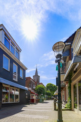 View at shopping street in Den Burg village on the wadden island Texel during Summer.