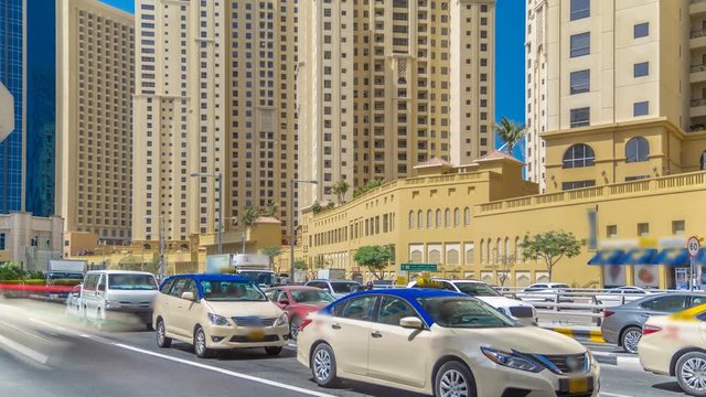A view of traffic on the street at Jumeirah Beach Residence and Dubai marina timelapse, United Arab Emirates.