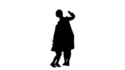Silhouette Smiling mother and daughter bonding together to take a selfie track matte