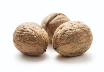 three walnuts isolated on white background